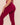 Back view of model wearing grape colored leggings