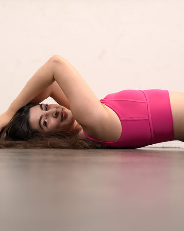 model in pink sports bra