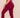Back view of model wearing grape colored leggings